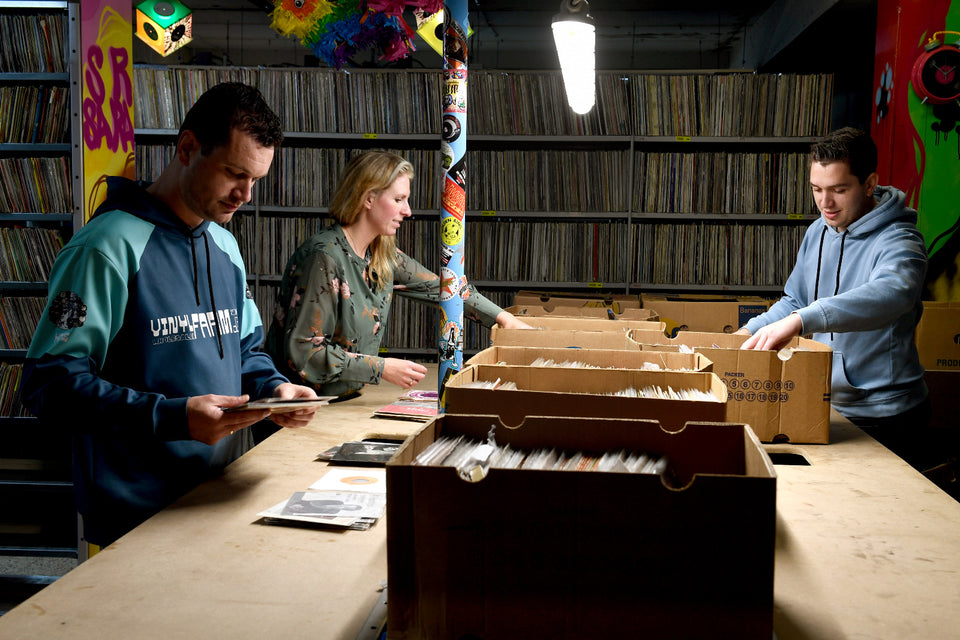 Inside Waxer, surrounded by vinyl records