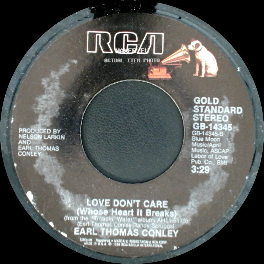 Earl Thomas Conley - Love Don't Care (Whose Heart It Breaks) / Honor Bound (Remix Version) side A