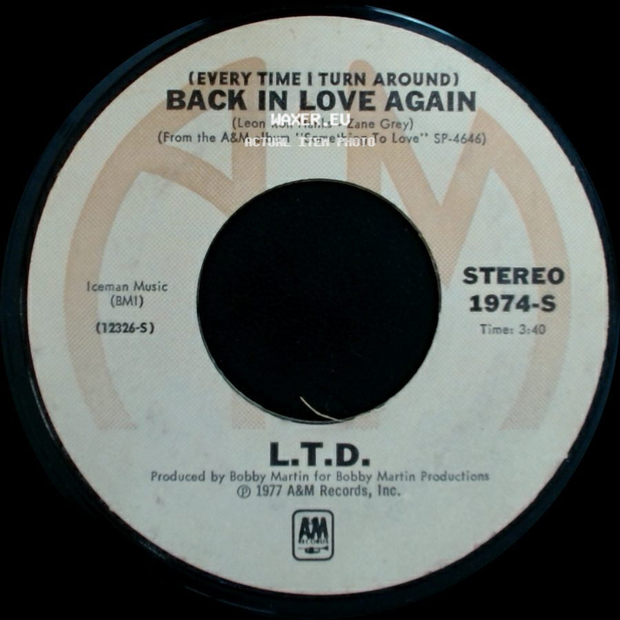 L.T.D. - Material Things / (Every Time I Turn Around) Back In Love Again side B