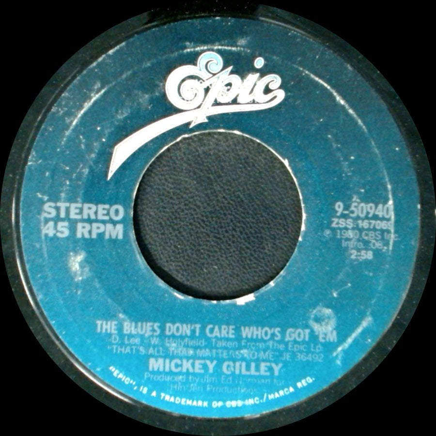 Mickey Gilley - The Blues Don't Care Who's Got 'em / That's All That Matters side A
