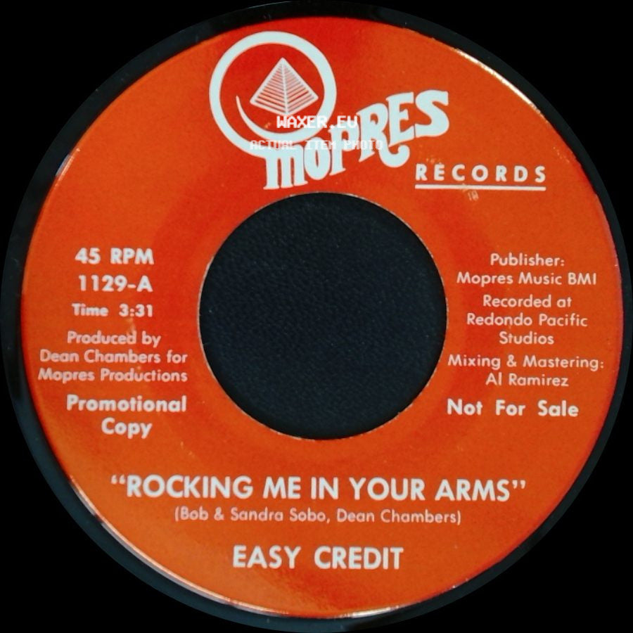 Easy Credit - Rocking Me In Your Arms / Listen To Your Heart side A
