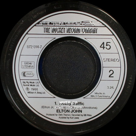 Elton John - A Word In Spanish / Heavy Traffic side B