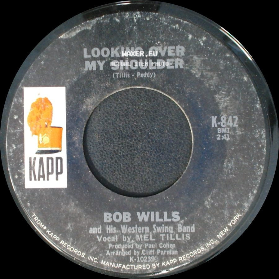 Bob Wills And His Western Swing Band - Looking Over My Shoulder / The Lady Felt The Cold At Home side A