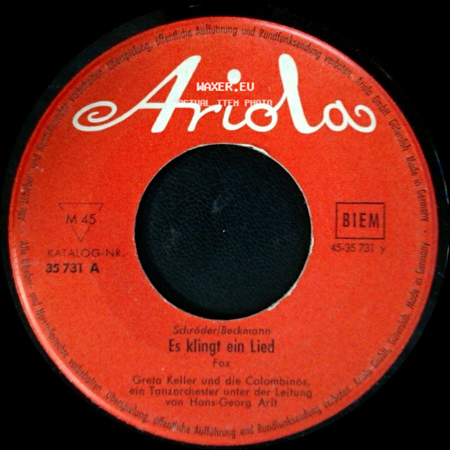 Greta Keller Und Die Colombinos / Greta Keller Und Ein Tanzorchester Unter Der Leitung Von Hans-Georg Arlt - Es Klingt Ein Lied / Eine Reise Ins Glück side A