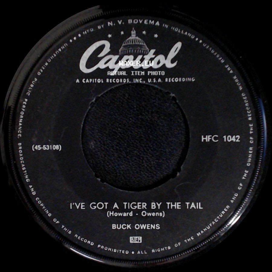 Buck Owens - I've Got A Tiger By The Tail / Cryin' Time side A