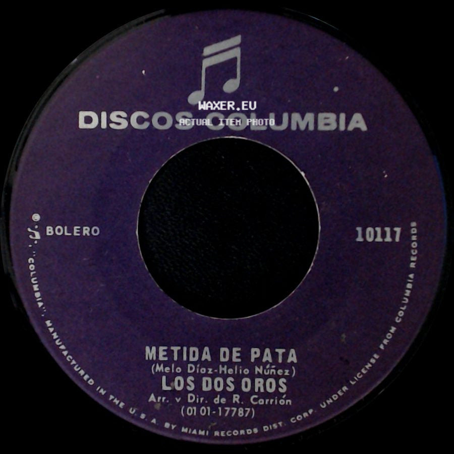 Los Dos Oros - Metida De Pata / Cuando Escucho Tu Nombre side A