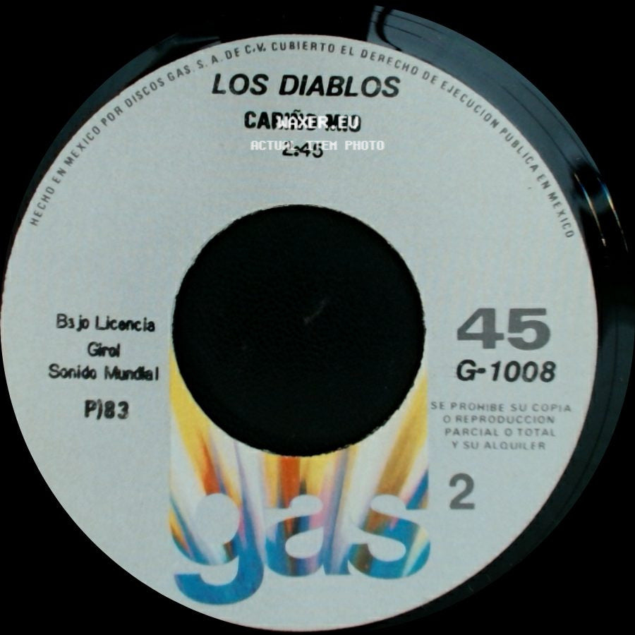 Los Diablos - A Cambio De Que / Cariño Mio side B