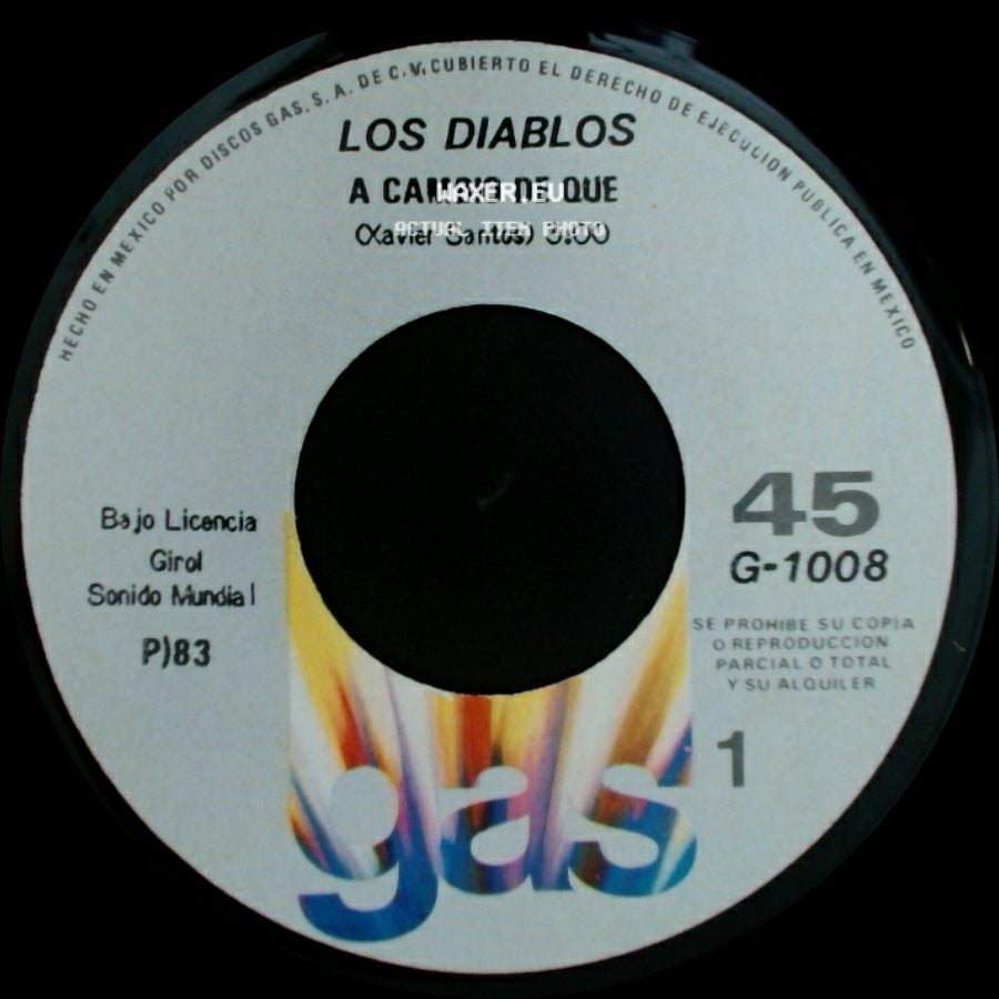 Los Diablos - A Cambio De Que / Cariño Mio side A