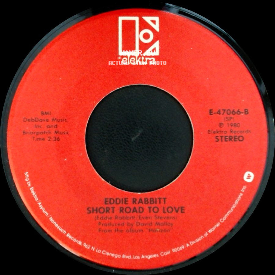Eddie Rabbitt - I Love A Rainy Night / Short Road To Love side B
