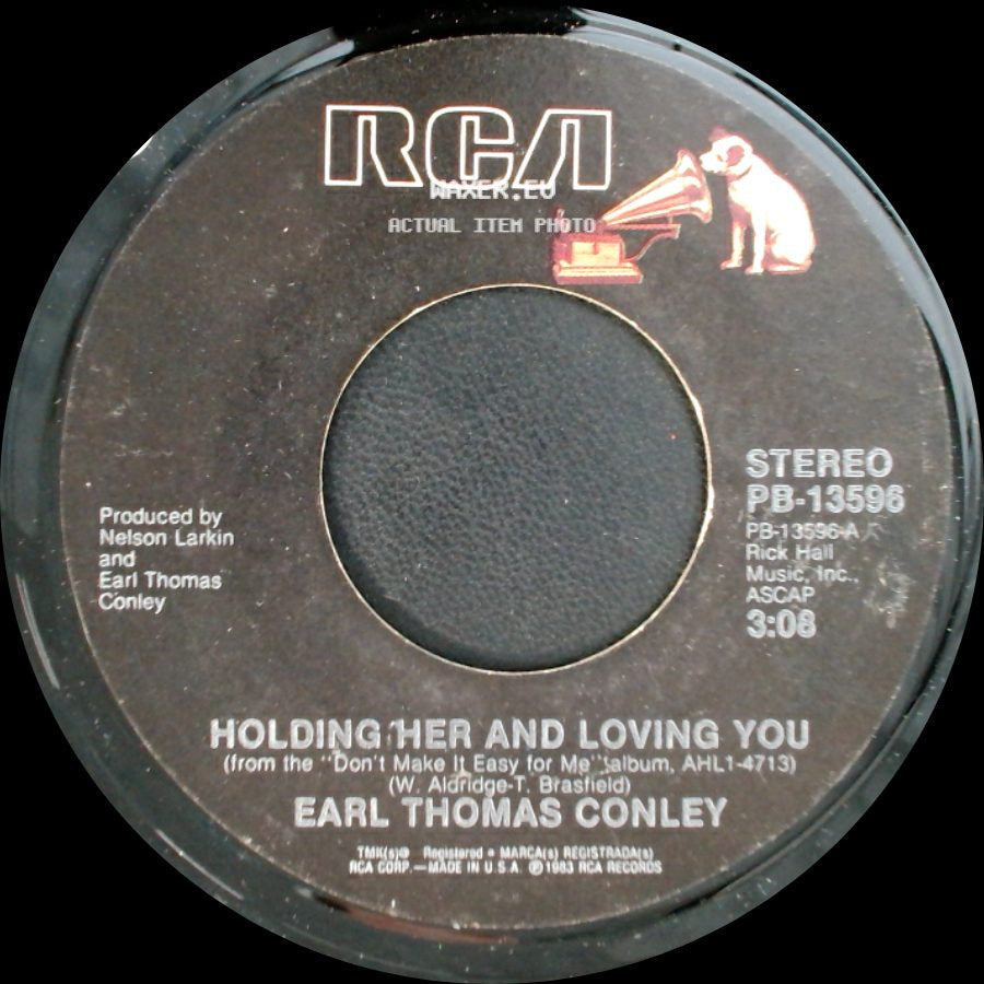 Earl Thomas Conley - Holding Her And Loving You / Home So Fine side A