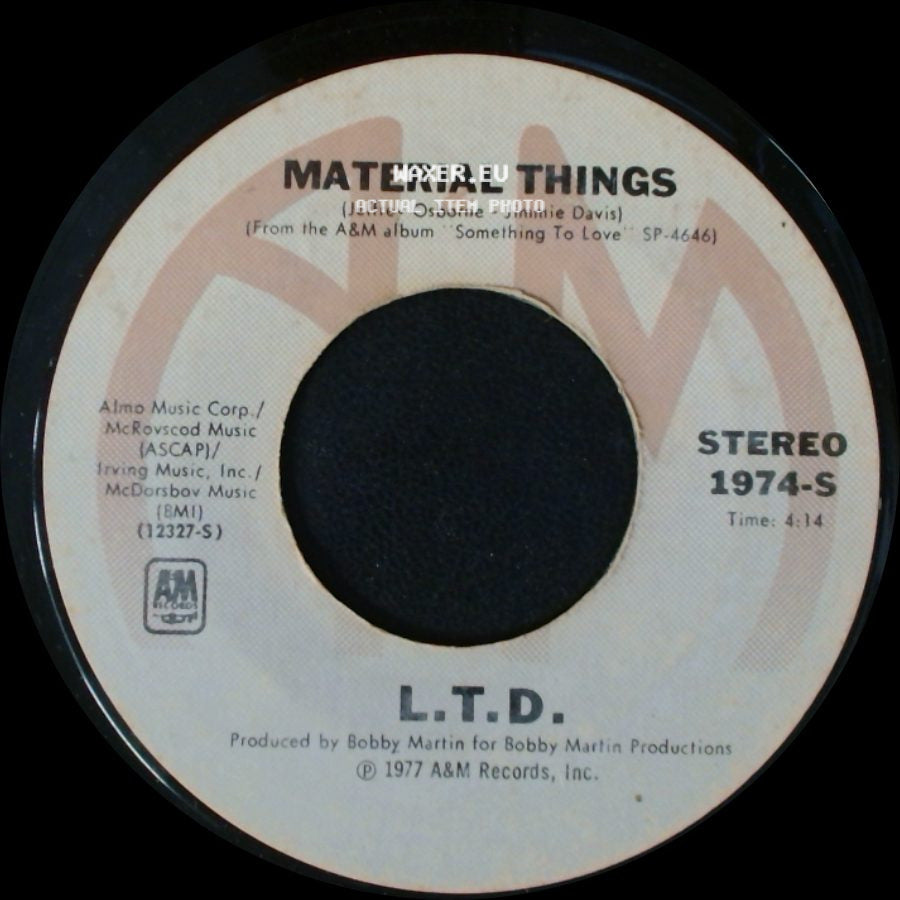 L.T.D. - (Every Time I Turn Around) Back In Love Again / Material Things side B