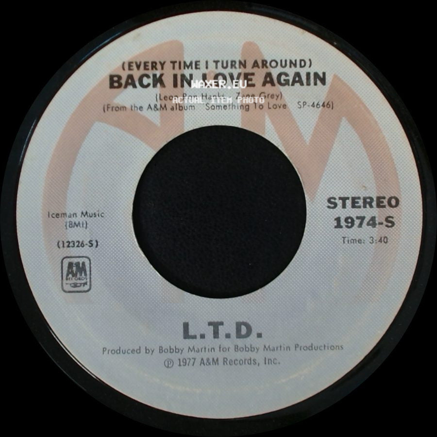 L.T.D. - Material Things / (Every Time I Turn Around) Back In Love Again side B
