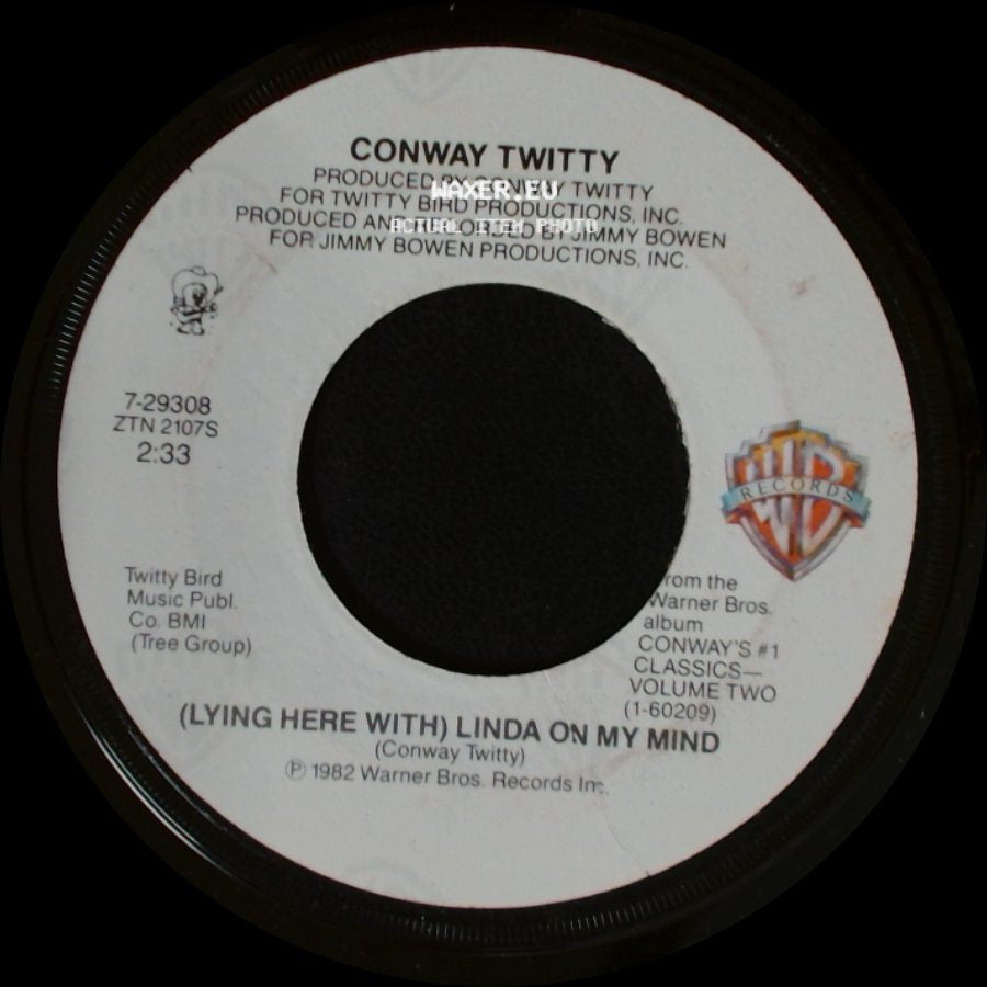 Conway Twitty - (Lying Here With) Linda On My Mind / Somebody's Needin' Somebody side A