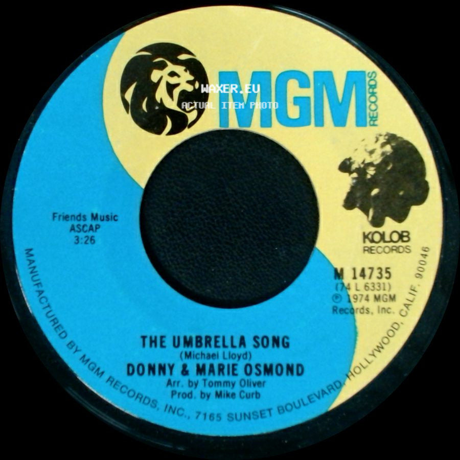 Donny & Marie Osmond - The Umbrella Song / I'm Leaving It [All] Up To You side A
