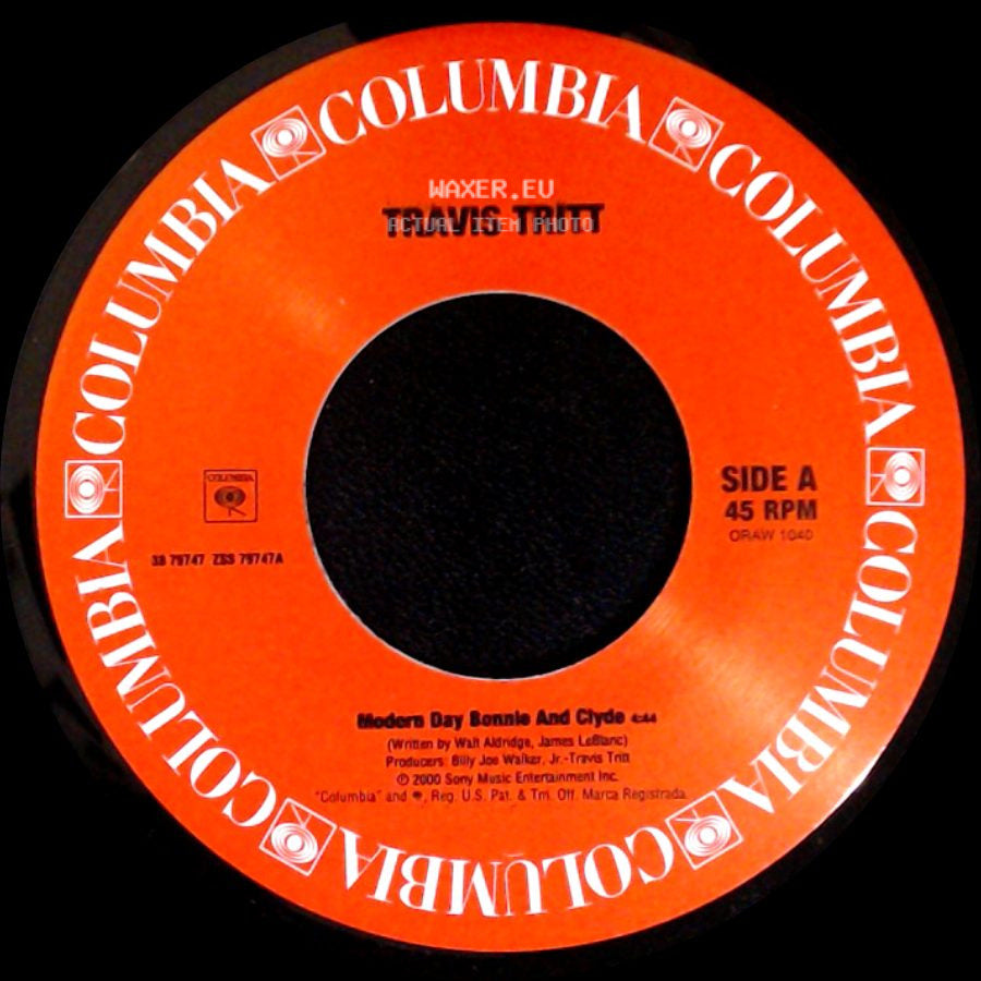 Travis Tritt - Modern Day Bonnie And Clyde / It's A Great Day To Be Alive side A