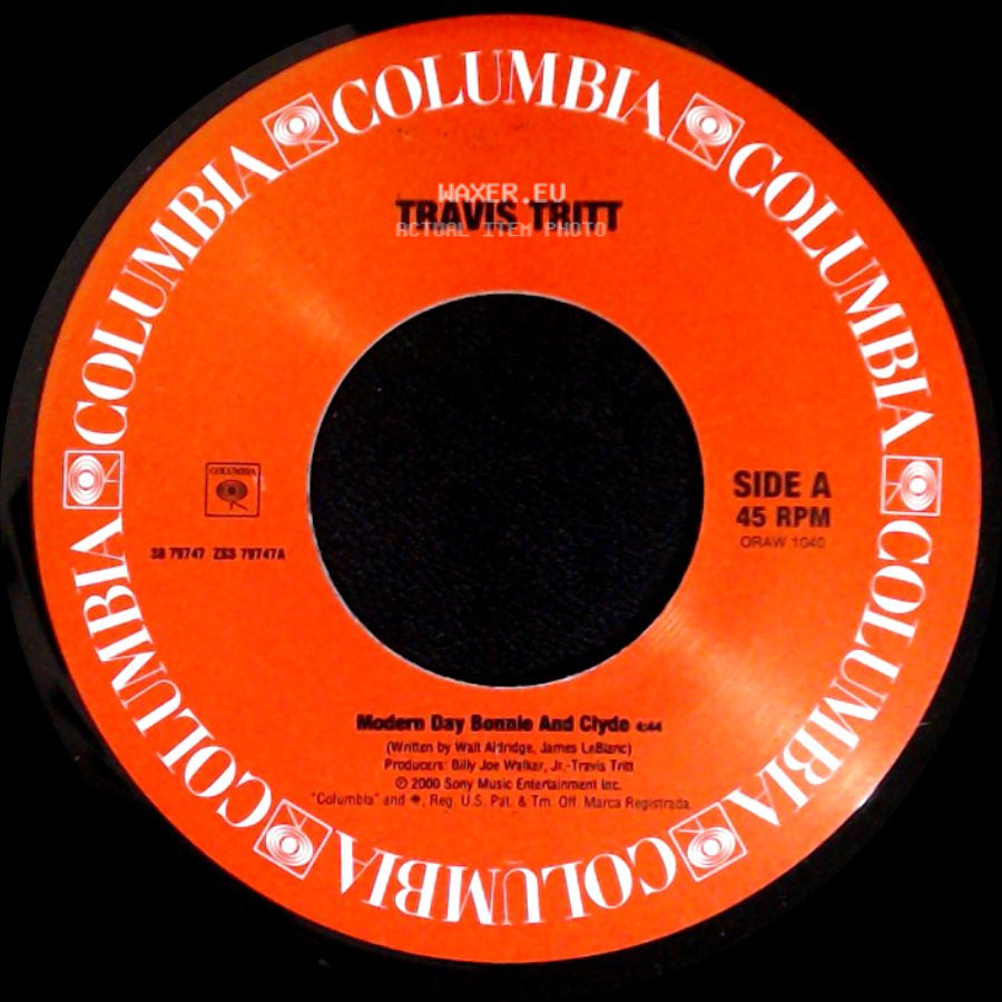 Travis Tritt - Modern Day Bonnie And Clyde / It's A Great Day To Be Alive side A
