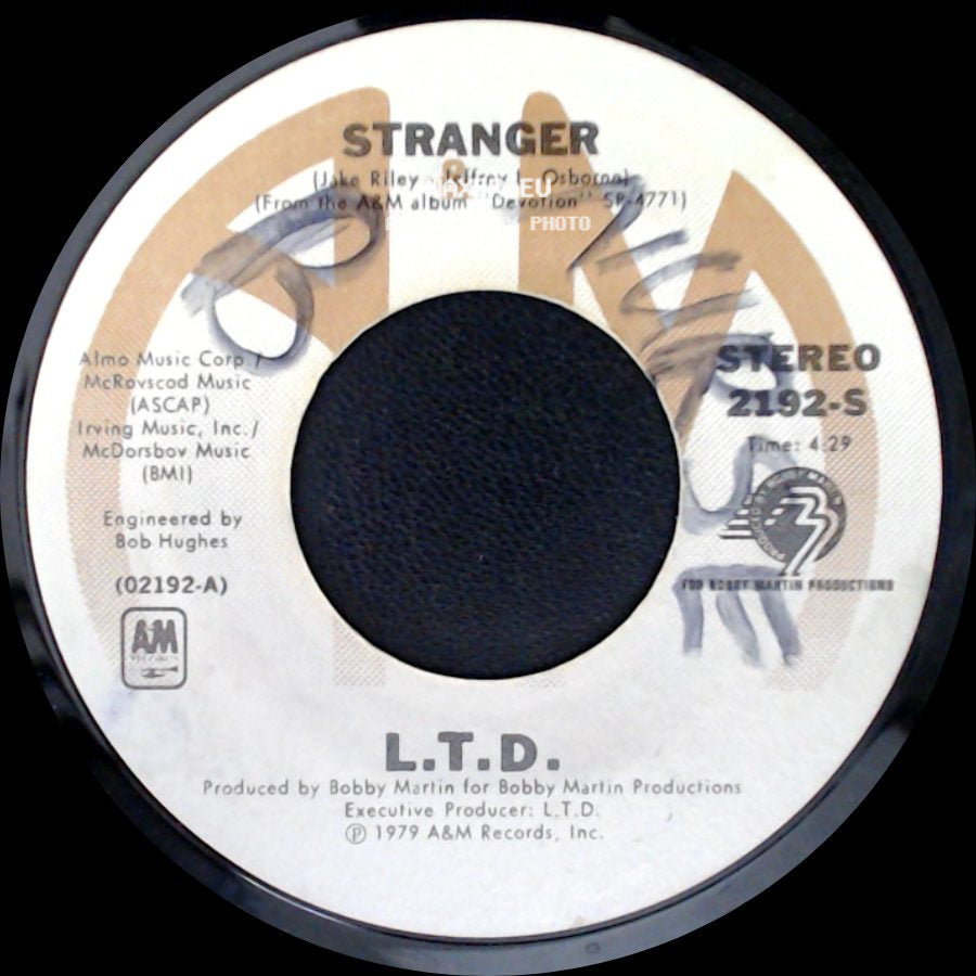 L.T.D. - Sometimes / Stranger side B