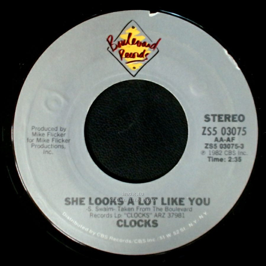 Clocks - She Looks A Lot Like You / Feeling This Way side A