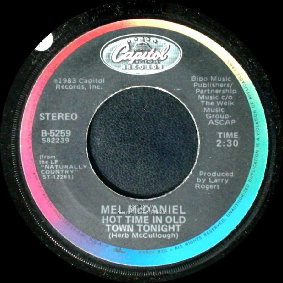 Mel Mcdaniel - Hot Time In Old Town Tonight / Some Folks Are Dying To Live Like This side A