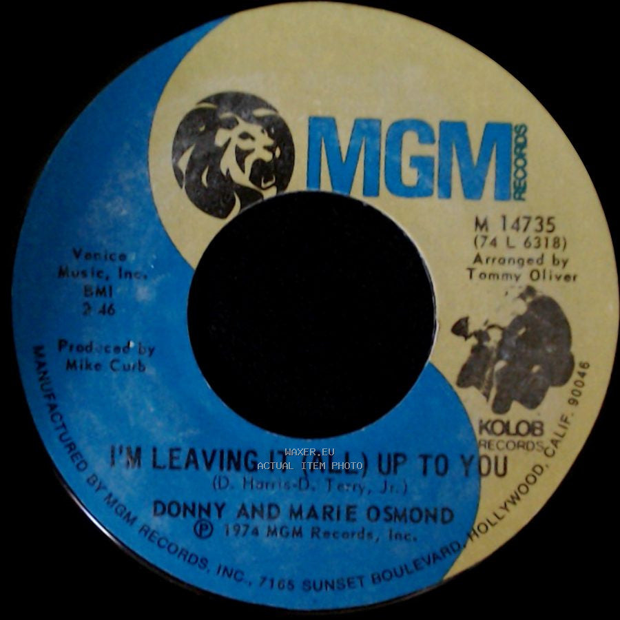 Donny And Marie Osmond - I'm Leaving It (All) Up To You / The Umbrella Song side A