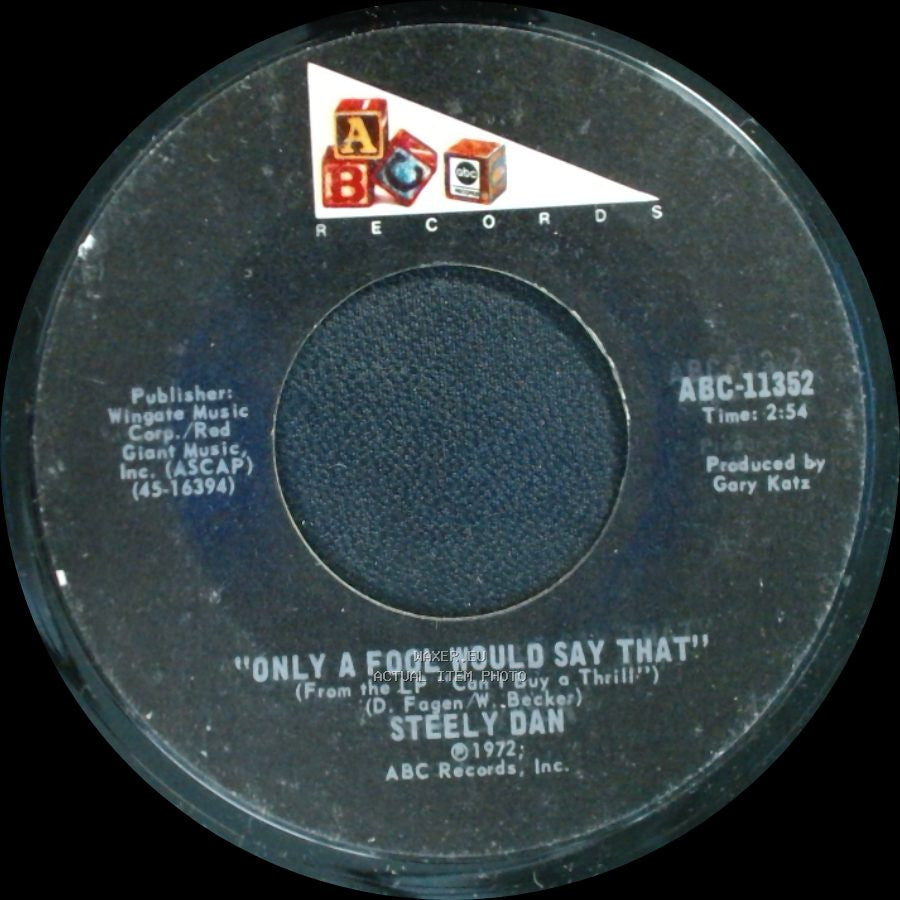 Steely Dan - Only A Fool Would Say That! / Reeling In The Years side A