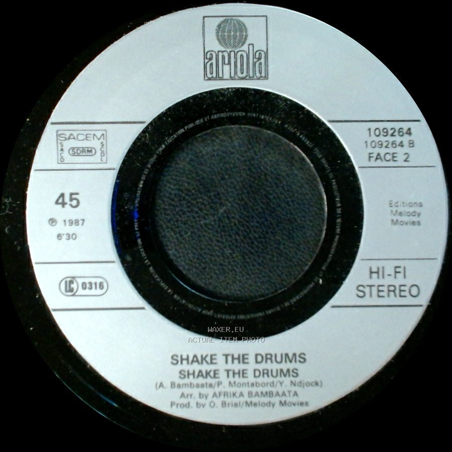 Afrika Bambaataa / Time Zone/Shake - Shake The Drums / Shake side A