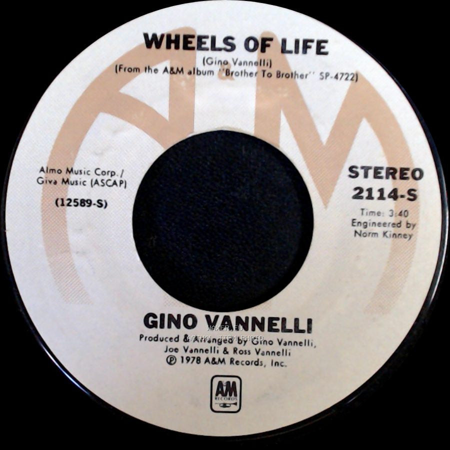Gino Vannelli - Wheels Of Life / Mardi Gras side A