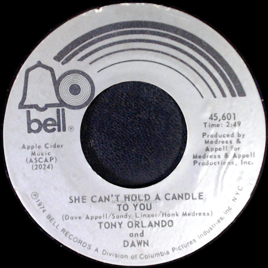 Tony Orlando And Dawn - She Can't Hold A Candle To You / Steppin' Out (Gonna Boogie Tonight) side A