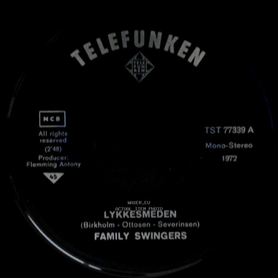 Family Swingers - Lykkesmeden / Gi' En Ærlig Chance side A