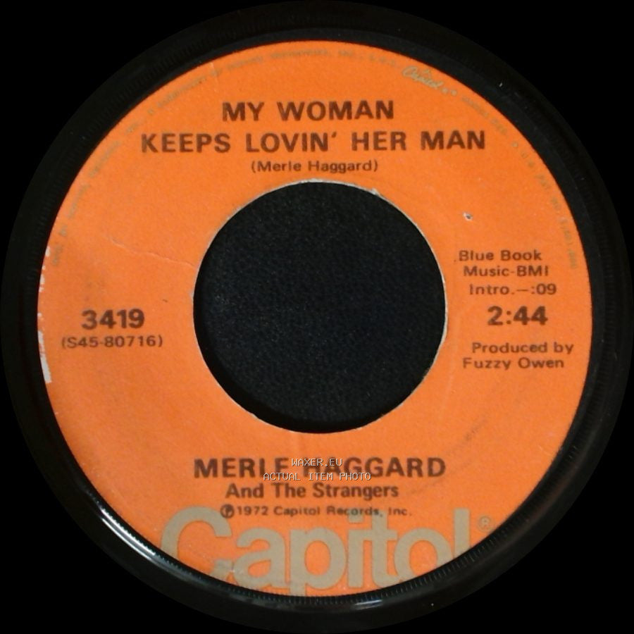Merle Haggard And The Strangers - My Woman Keeps Lovin' Her Man / It's Not Love (But It's Not Bad) side A
