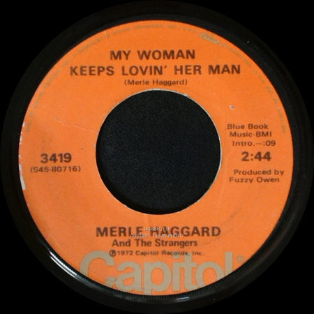 Merle Haggard And The Strangers - My Woman Keeps Lovin' Her Man / It's Not Love (But It's Not Bad) side A